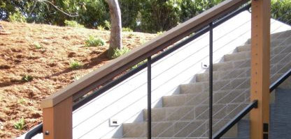 steel cable railing with wooden posts